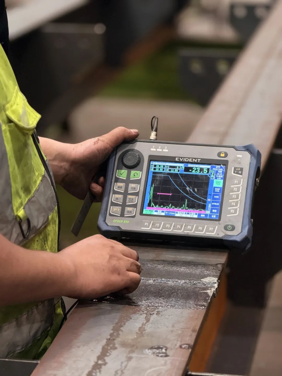 QC is conducting non-destructive testing of welds according to ISO 9712